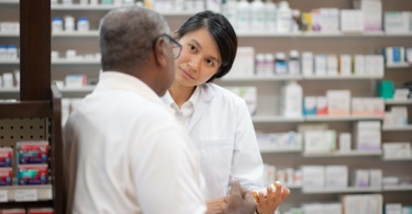 Photo of two pharmacists having a conversation 
