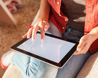 Woman using her tablet