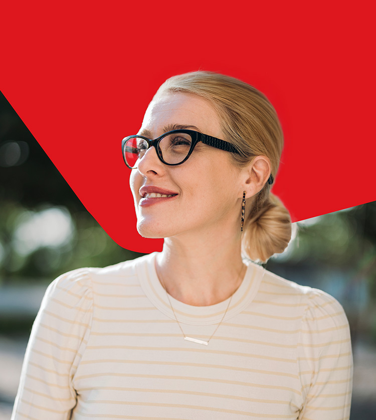 Photo of a woman who took advantage of National Bank's business banking solutions and wealth management services 