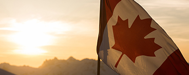 Canadian flag at sunset