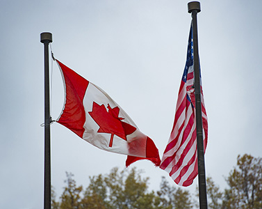 Canadian and American flags
