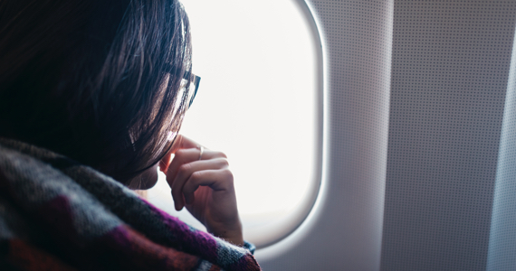 Woman sitting on a plane