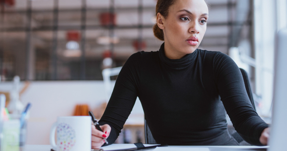 Young professional woman working on her computer