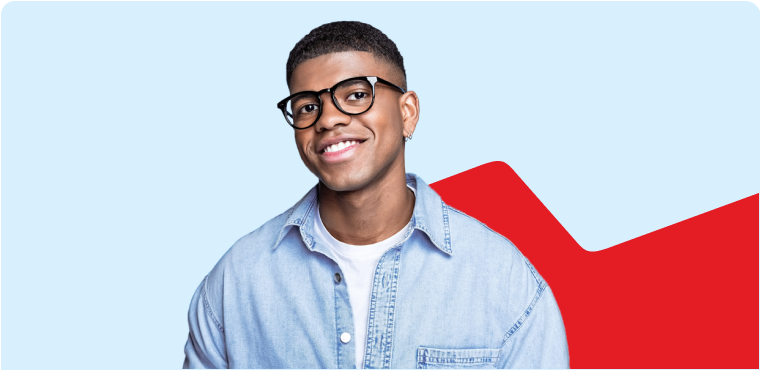 Photo of a man wearing glasses and a blue shirt 