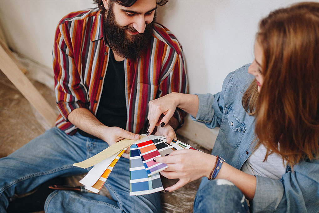 Couple choosing paint colours 