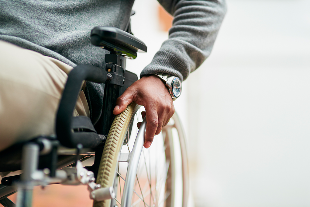 RDSP holder sitting in a wheelchair.