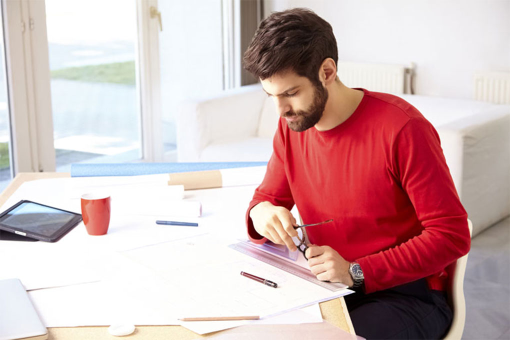 Man at a desk with papers