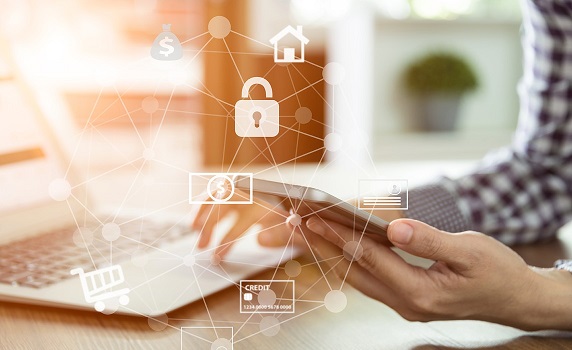 Photo of a hand holding a mobile phone with pictos of a padlock, house, dollar bill, and credit card