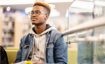 Photo of a young person in an office