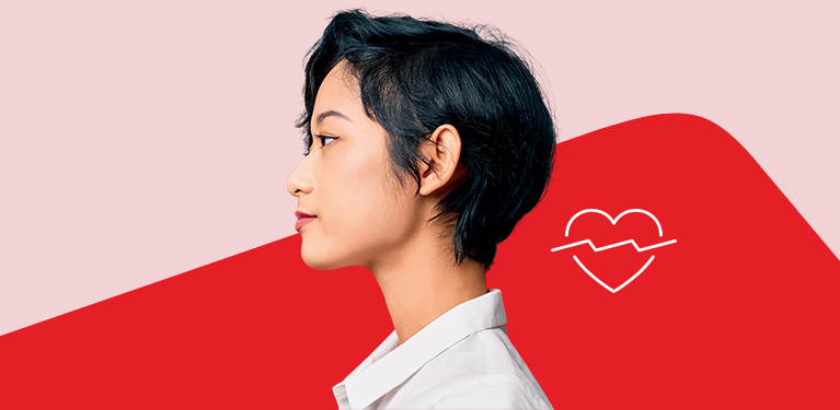 Photo of a person’s side profile in front of the National Bank logo   